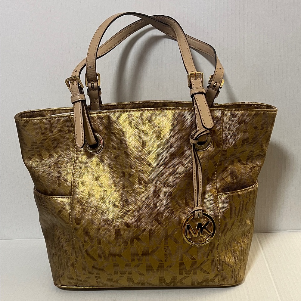 Michael Kors Signature Jet Set Travel Metallic Large Tote bag in Gold